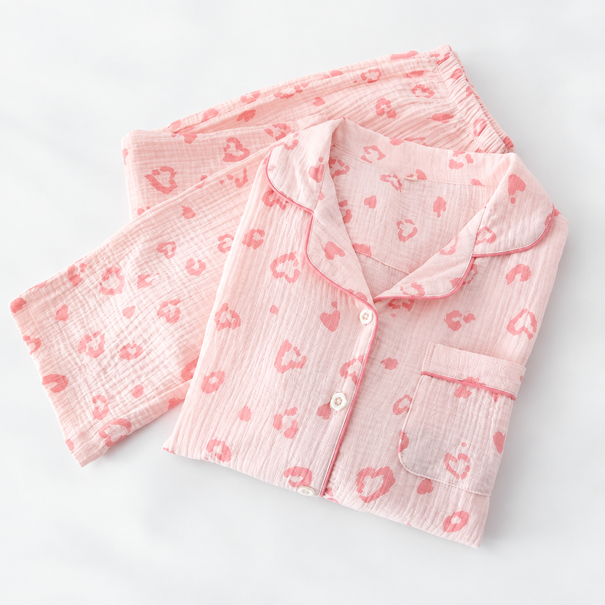 Gemusterter Pyjama in Rosa – retuschierte Produktansicht